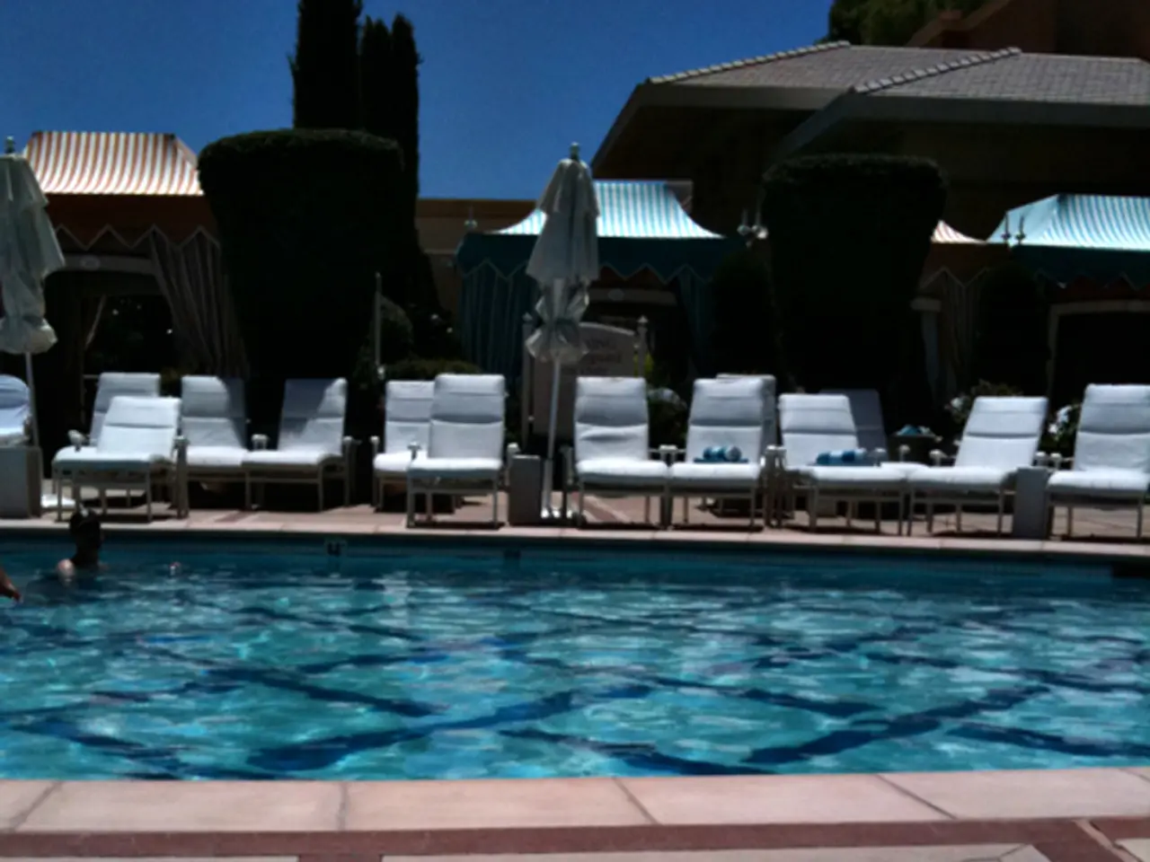 Kourtney Kardashian showcases her figure in a thong swimsuit following denial of pregnancy...