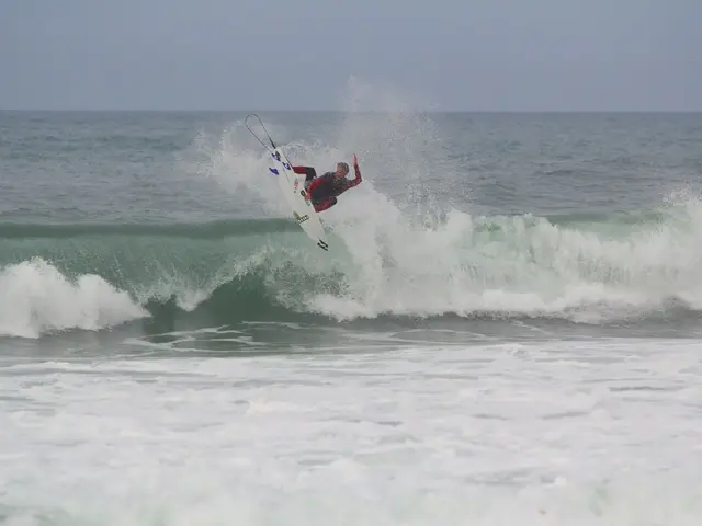 Meghan, Duchess of Sussex, expresses admiration for her spouse Prince Harry during a surfing...