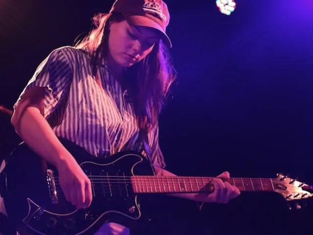 Angelina Mango starring in the band's production, "Poké Melodrama"