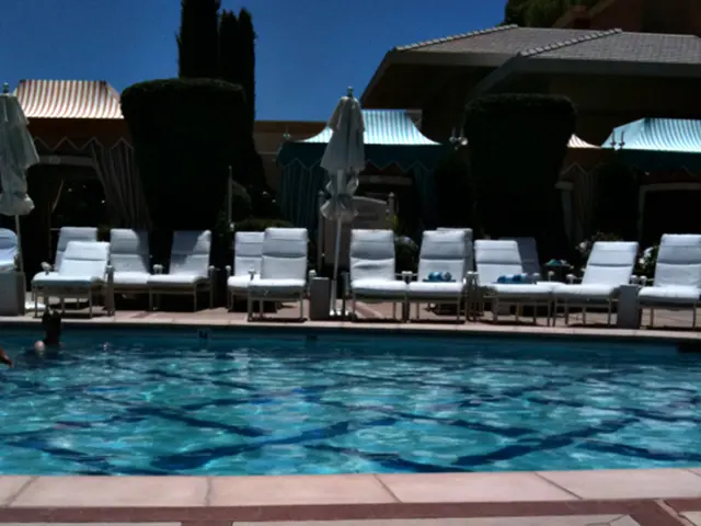 Kourtney Kardashian showcases her figure in a thong swimsuit following denial of pregnancy...