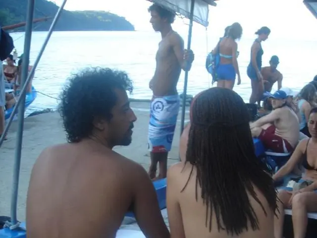 "Eight-year-old child sustains severe leg injury following a shark attack, with heavy blood loss...