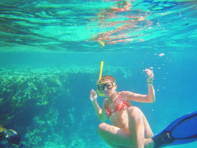 Sharon Stone, aged 67, displays a daring animal-patterned swimsuit during a delightful boat trip,...