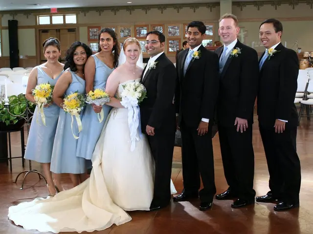 Pairing of a white tank top, track pants, and yellow heels