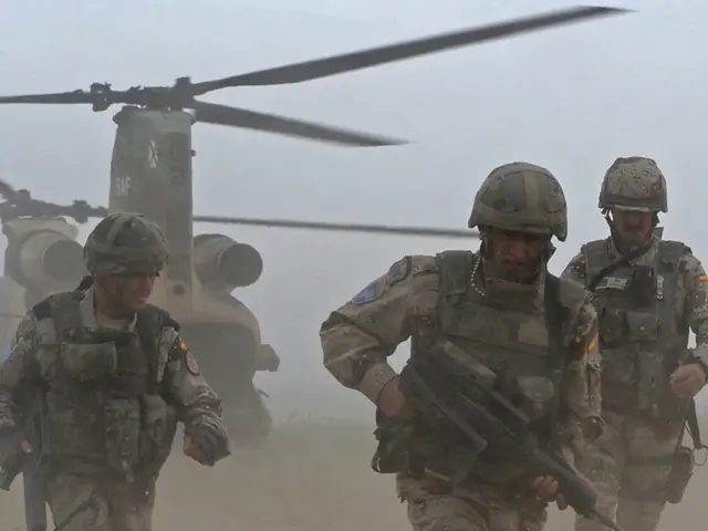 Military personnel experiences accident upon disembarking from a helicopter