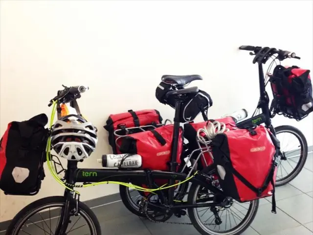 Equipment for securing and transporting items on bicycles: Apidura Fork Pack and Cargo Cage